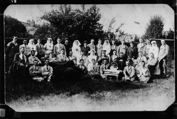 Photograph of Corporal John Henry Kelty with patients and nurses (3)