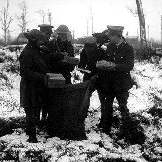 Christmas mail - photo of Artillery Officers with their Christmas mail-bag.